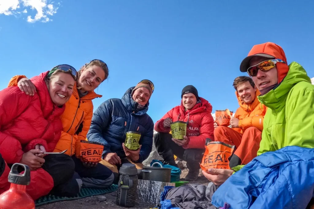 a group of people enjoying real turmat