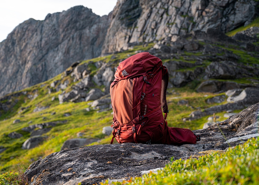 backpacking resting standing in the mountain