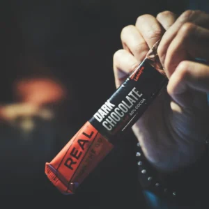 dark chocolate in hand