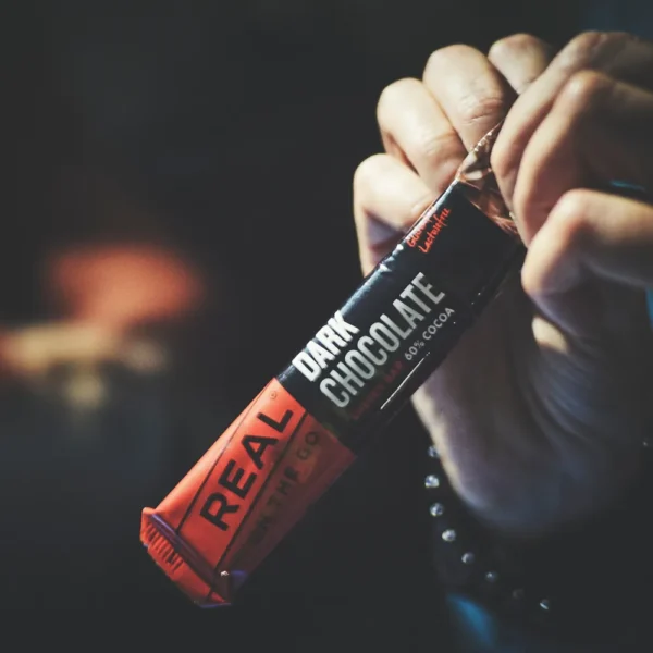 dark chocolate in hand