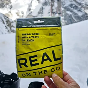 energy drink in hand in the winter