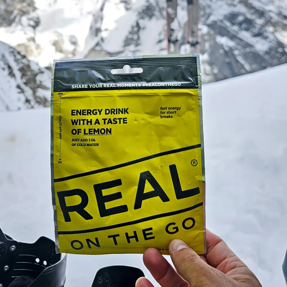 energy drink in hand in the winter